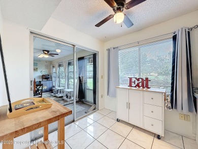 GROUND FLOOR CONDO located on the 8th Fairway of the Heather on Heather Golf and Country Club in Florida - for sale on GolfHomes.com, golf home, golf lot