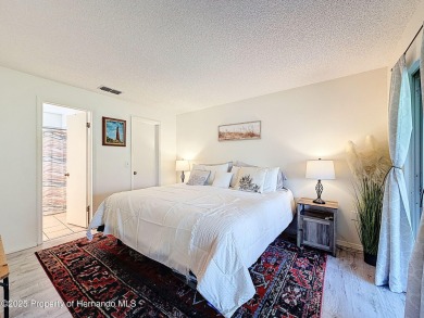 GROUND FLOOR CONDO located on the 8th Fairway of the Heather on Heather Golf and Country Club in Florida - for sale on GolfHomes.com, golf home, golf lot