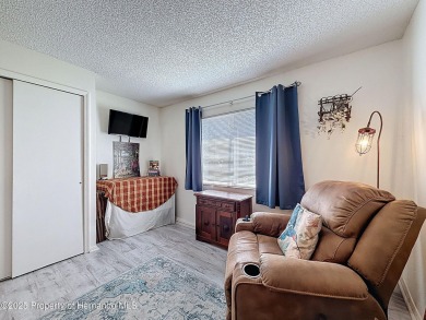 GROUND FLOOR CONDO located on the 8th Fairway of the Heather on Heather Golf and Country Club in Florida - for sale on GolfHomes.com, golf home, golf lot