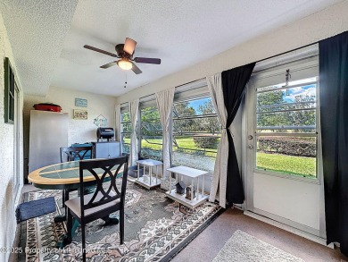 GROUND FLOOR CONDO located on the 8th Fairway of the Heather on Heather Golf and Country Club in Florida - for sale on GolfHomes.com, golf home, golf lot