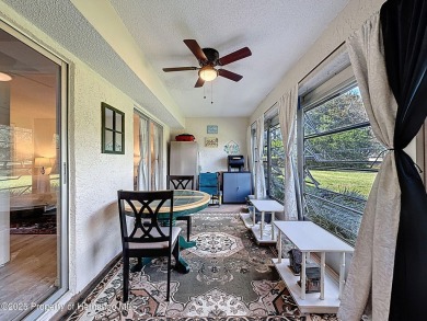 GROUND FLOOR CONDO located on the 8th Fairway of the Heather on Heather Golf and Country Club in Florida - for sale on GolfHomes.com, golf home, golf lot