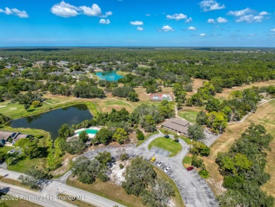 GROUND FLOOR CONDO located on the 8th Fairway of the Heather on Heather Golf and Country Club in Florida - for sale on GolfHomes.com, golf home, golf lot