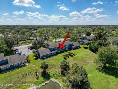 GROUND FLOOR CONDO located on the 8th Fairway of the Heather on Heather Golf and Country Club in Florida - for sale on GolfHomes.com, golf home, golf lot