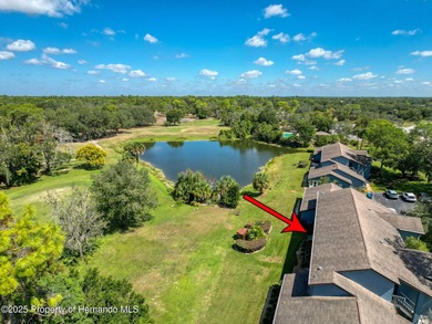 GROUND FLOOR CONDO located on the 8th Fairway of the Heather on Heather Golf and Country Club in Florida - for sale on GolfHomes.com, golf home, golf lot
