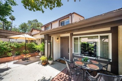 Charming 3-bedroom townhome in the highly sought-after Valencia on Vista Valencia Golf Course in California - for sale on GolfHomes.com, golf home, golf lot