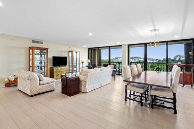 From the moment you enter, you're greeted by panoramic views of on The President Country Club in Florida - for sale on GolfHomes.com, golf home, golf lot