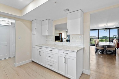 From the moment you enter, you're greeted by panoramic views of on The President Country Club in Florida - for sale on GolfHomes.com, golf home, golf lot