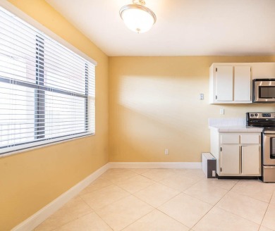 Don't miss this corner two-bedroom, two-bath condo in Sunrise on Sunrise Lakes Phase IV Golf Course in Florida - for sale on GolfHomes.com, golf home, golf lot