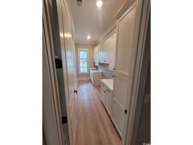 This is coastal living at it's finest! Check out the private on Myrtlewood Golf Course and Club  in South Carolina - for sale on GolfHomes.com, golf home, golf lot