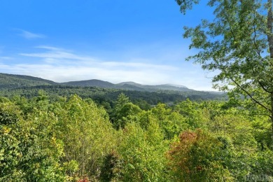 Offering relaxed mountain living in a scenic gated community on The Country Club of Sapphire Valley in North Carolina - for sale on GolfHomes.com, golf home, golf lot