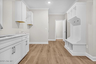 NOW READY TO CALL HOME! The Krystal's Retreat by Howard Builders on Lockwood Folly Country Club in North Carolina - for sale on GolfHomes.com, golf home, golf lot