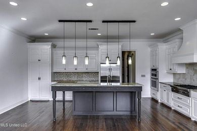 Beautifully appointed home located in the highly sought-after on Reunion Golf Club in Mississippi - for sale on GolfHomes.com, golf home, golf lot