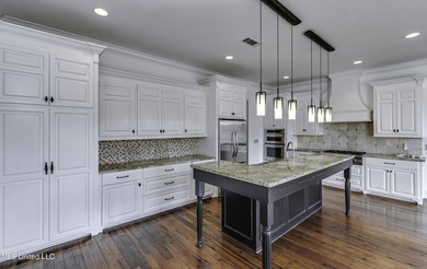 Beautifully appointed home located in the highly sought-after on Reunion Golf Club in Mississippi - for sale on GolfHomes.com, golf home, golf lot