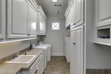 Beautifully appointed home located in the highly sought-after on Reunion Golf Club in Mississippi - for sale on GolfHomes.com, golf home, golf lot