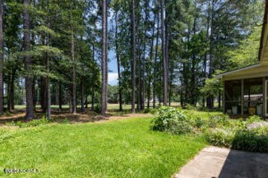 Situated alongside the Wilson Country Club golf course, this on Wilson Country Club in North Carolina - for sale on GolfHomes.com, golf home, golf lot