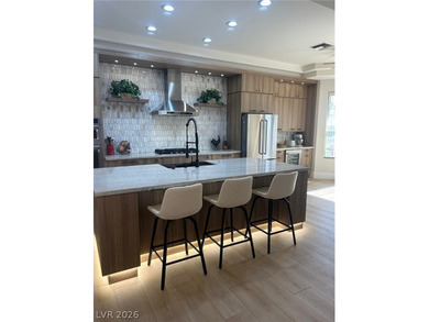 Remarkable home in the coveted Sun City Summerlin! Oversized on Highland Falls Golf Club in Nevada - for sale on GolfHomes.com, golf home, golf lot