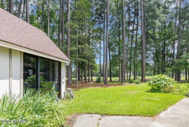 Situated alongside the Wilson Country Club golf course, this on Wilson Country Club in North Carolina - for sale on GolfHomes.com, golf home, golf lot