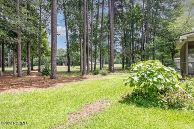 Situated alongside the Wilson Country Club golf course, this on Wilson Country Club in North Carolina - for sale on GolfHomes.com, golf home, golf lot