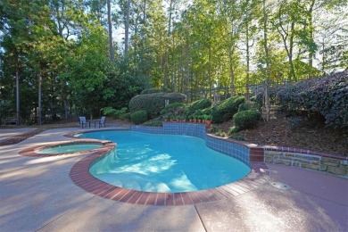 Welcome to this beautifully updated ranch-style home in the on The Golf Club of Georgia in Georgia - for sale on GolfHomes.com, golf home, golf lot