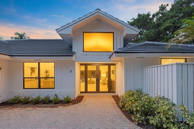 Discover refined luxury in this fully renovated 4,458 sq. ft on PGA National Golf Club in Florida - for sale on GolfHomes.com, golf home, golf lot