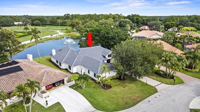 Discover refined luxury in this fully renovated 4,458 sq. ft on PGA National Golf Club in Florida - for sale on GolfHomes.com, golf home, golf lot