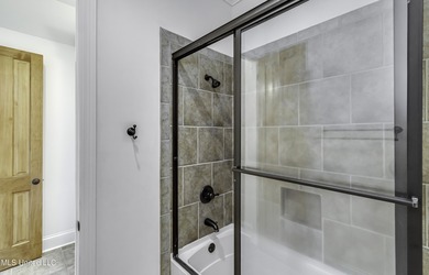 Beautifully appointed home located in the highly sought-after on Reunion Golf Club in Mississippi - for sale on GolfHomes.com, golf home, golf lot