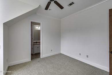 Beautifully appointed home located in the highly sought-after on Reunion Golf Club in Mississippi - for sale on GolfHomes.com, golf home, golf lot