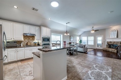 Perfectly situated in Frisco's Heritage Lakes, a gated community on Heritage Lakes - Par 3 - 9 Hole Course in Texas - for sale on GolfHomes.com, golf home, golf lot