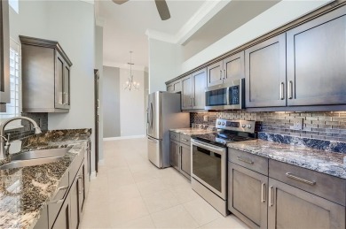 Experience breathtaking sunsets with sweeping water and golf on Estero Country Club in Florida - for sale on GolfHomes.com, golf home, golf lot