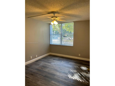 **SPACIOUS AND BRIGHT 3/2 - COMPLETELY RENOVATED FIRST FLOOR on Inverrary Country Club in Florida - for sale on GolfHomes.com, golf home, golf lot