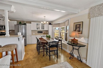 2bed/2bath home with a lovely golf course view in Barefoot Bay! on Barefoot Bay Golf Course in Florida - for sale on GolfHomes.com, golf home, golf lot