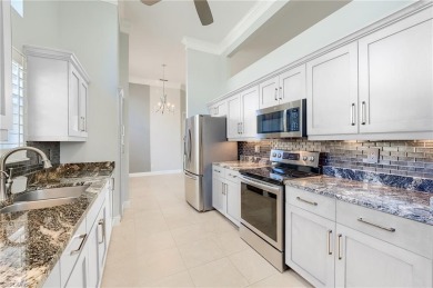 Experience breathtaking sunsets with sweeping water and golf on Estero Country Club in Florida - for sale on GolfHomes.com, golf home, golf lot