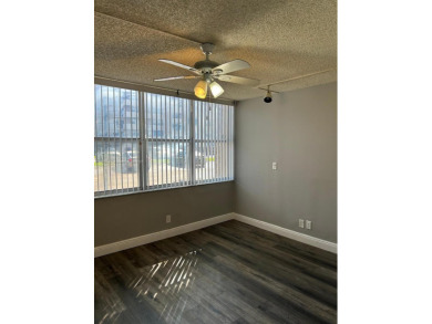 **SPACIOUS AND BRIGHT 3/2 - COMPLETELY RENOVATED FIRST FLOOR on Inverrary Country Club in Florida - for sale on GolfHomes.com, golf home, golf lot