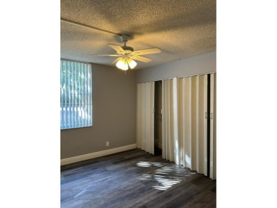 **SPACIOUS AND BRIGHT 3/2 - COMPLETELY RENOVATED FIRST FLOOR on Inverrary Country Club in Florida - for sale on GolfHomes.com, golf home, golf lot