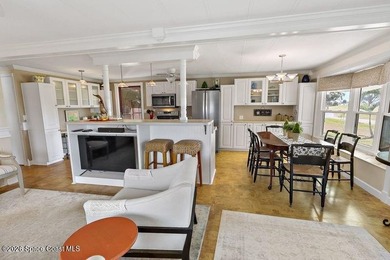 2bed/2bath home with a lovely golf course view in Barefoot Bay! on Barefoot Bay Golf Course in Florida - for sale on GolfHomes.com, golf home, golf lot