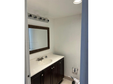**SPACIOUS AND BRIGHT 3/2 - COMPLETELY RENOVATED FIRST FLOOR on Inverrary Country Club in Florida - for sale on GolfHomes.com, golf home, golf lot