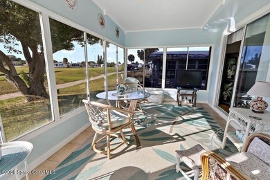 2bed/2bath home with a lovely golf course view in Barefoot Bay! on Barefoot Bay Golf Course in Florida - for sale on GolfHomes.com, golf home, golf lot