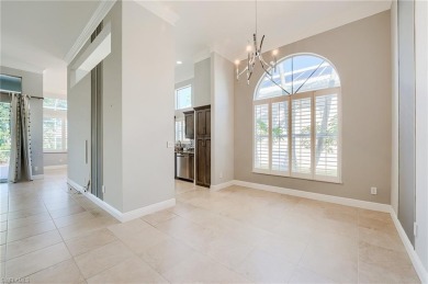 Experience breathtaking sunsets with sweeping water and golf on Estero Country Club in Florida - for sale on GolfHomes.com, golf home, golf lot
