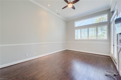 Experience breathtaking sunsets with sweeping water and golf on Estero Country Club in Florida - for sale on GolfHomes.com, golf home, golf lot