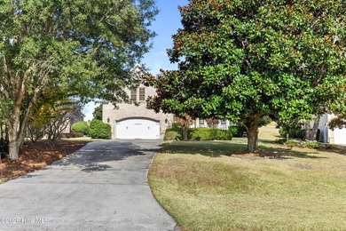 Located in the gated community on a quiet cul de sac, this brick on Members Club At St. James Plantation in North Carolina - for sale on GolfHomes.com, golf home, golf lot