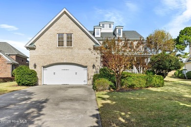 Located in the gated community on a quiet cul de sac, this brick on Members Club At St. James Plantation in North Carolina - for sale on GolfHomes.com, golf home, golf lot