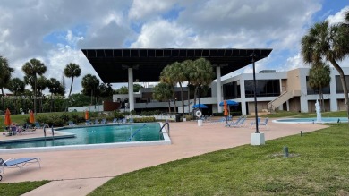 **SPACIOUS AND BRIGHT 3/2 - COMPLETELY RENOVATED FIRST FLOOR on Inverrary Country Club in Florida - for sale on GolfHomes.com, golf home, golf lot