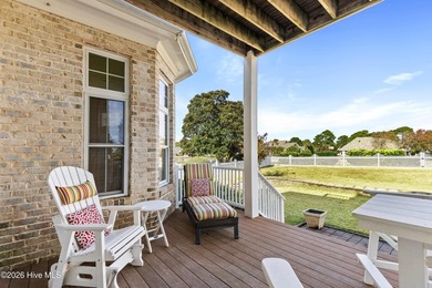 Located in the gated community on a quiet cul de sac, this brick on Members Club At St. James Plantation in North Carolina - for sale on GolfHomes.com, golf home, golf lot