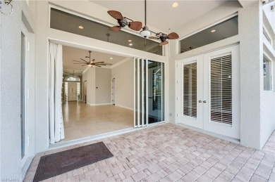 Experience breathtaking sunsets with sweeping water and golf on Estero Country Club in Florida - for sale on GolfHomes.com, golf home, golf lot
