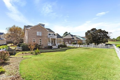 Located in the gated community on a quiet cul de sac, this brick on Members Club At St. James Plantation in North Carolina - for sale on GolfHomes.com, golf home, golf lot
