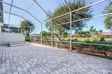 Experience breathtaking sunsets with sweeping water and golf on Estero Country Club in Florida - for sale on GolfHomes.com, golf home, golf lot