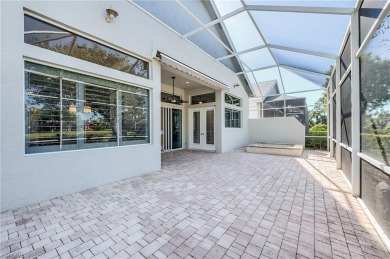 Experience breathtaking sunsets with sweeping water and golf on Estero Country Club in Florida - for sale on GolfHomes.com, golf home, golf lot