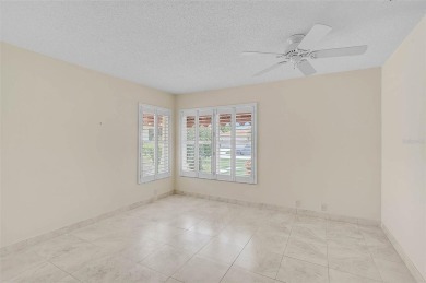 Discover this well-maintained 3BR/2BA Patio home with a private on Peridia Golf and Country Club in Florida - for sale on GolfHomes.com, golf home, golf lot