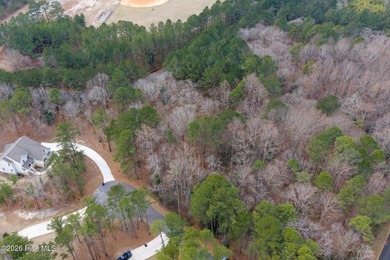 Nice interior lot located in the gated community of Seven Lakes on Seven Lakes Country Club in North Carolina - for sale on GolfHomes.com, golf home, golf lot