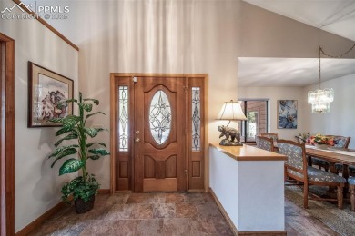 Custom RANCH-STYLE Home is with Finished Walkout Basement on on The Golf Club At Bear Dance in Colorado - for sale on GolfHomes.com, golf home, golf lot